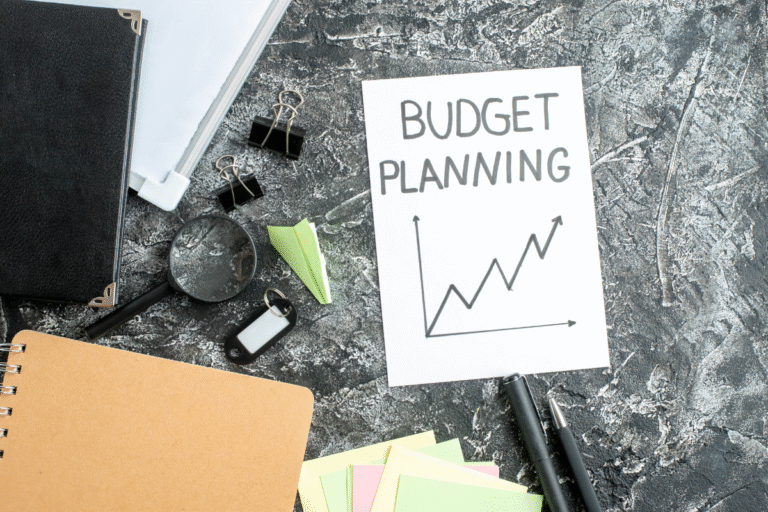 Budget planning chart with upward graph and office supplies representing small business financial strategy in Australia